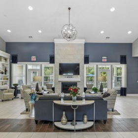 A perfect fit for the whole family a large room with a large table and chairs